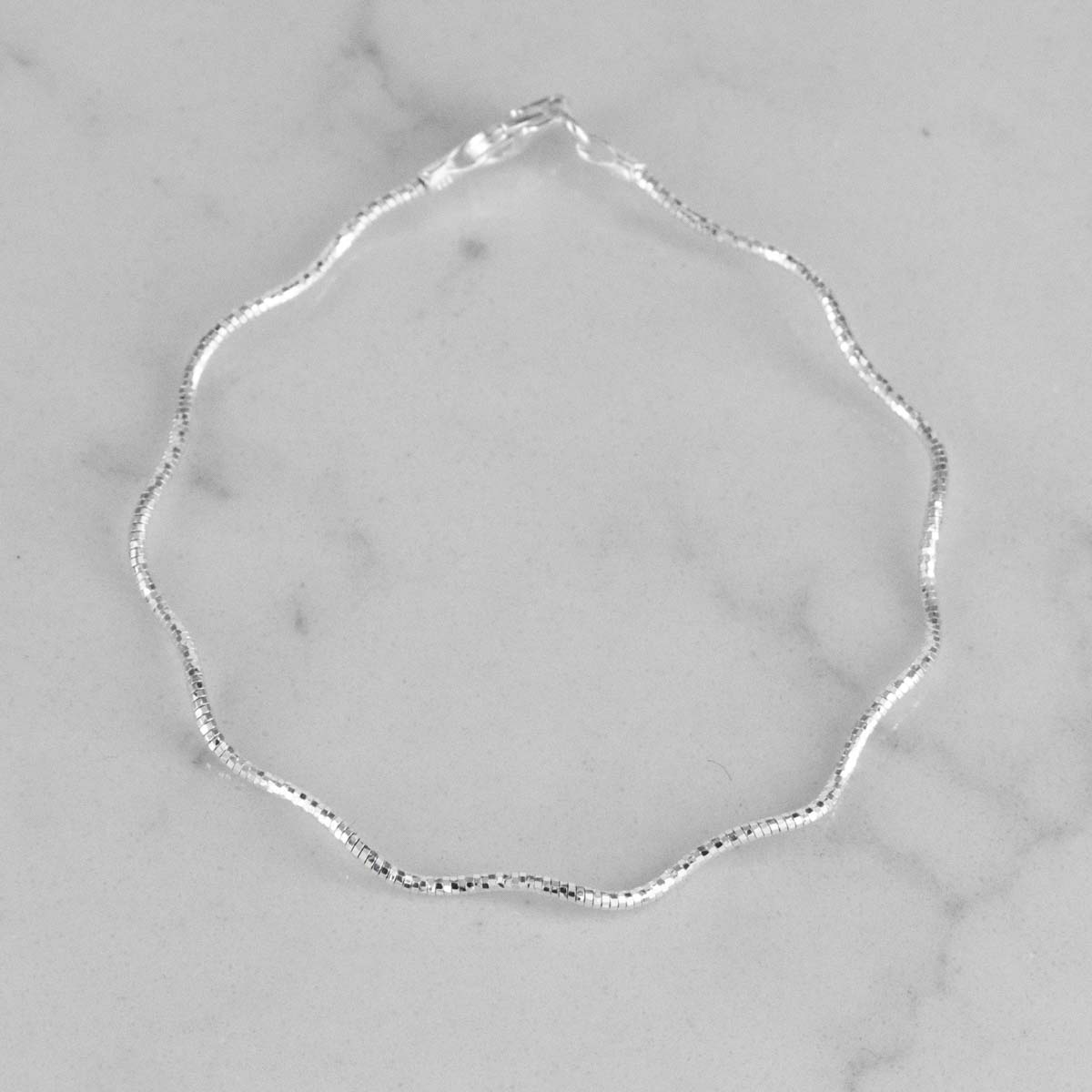 PULSERA RIGIDA ONDULADA 1.5MM-18CM
